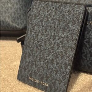 Michael Kors Navy Passport Holder with signature logo